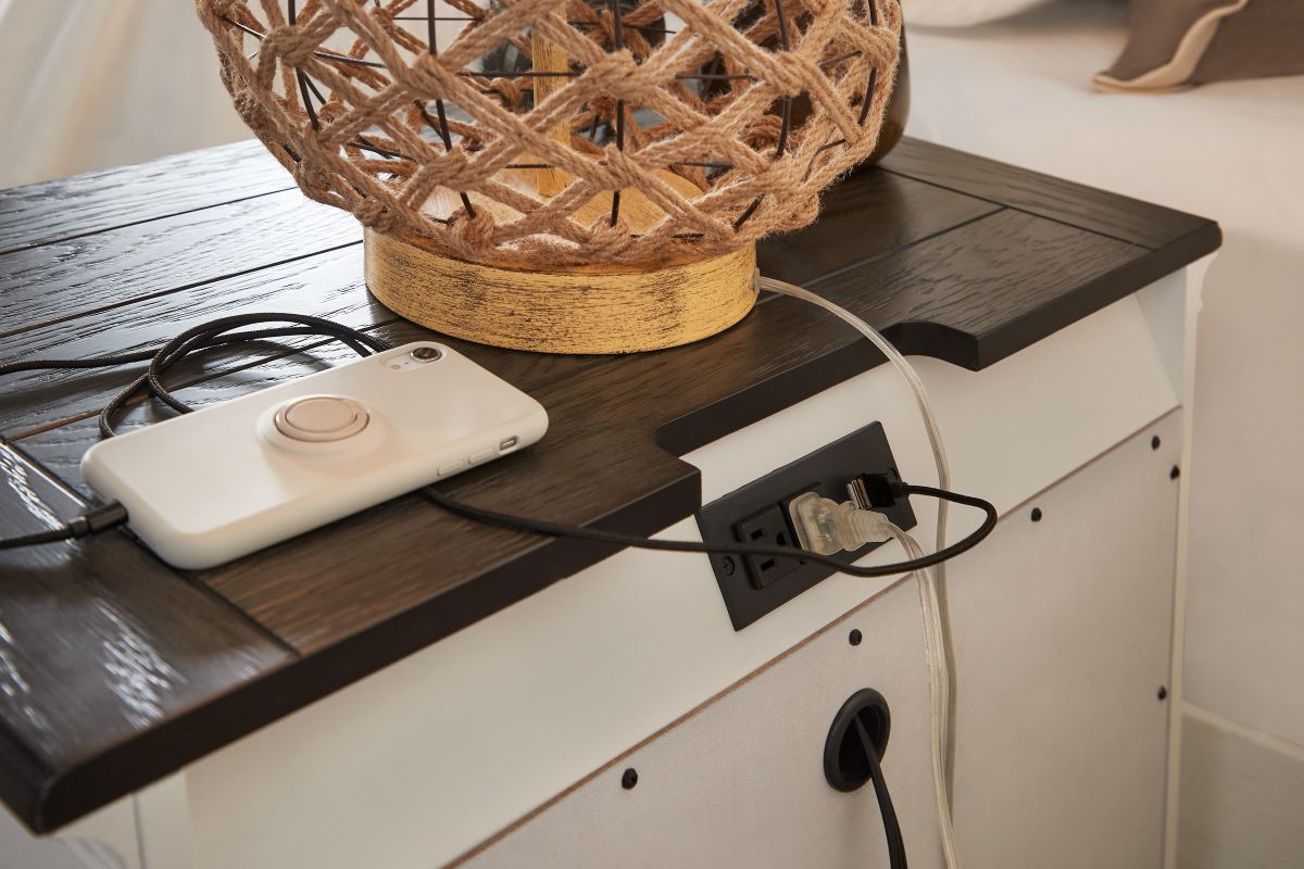 Top back portion of the Higgins nightstand showing the plug that can accommodate USB and standard plugs