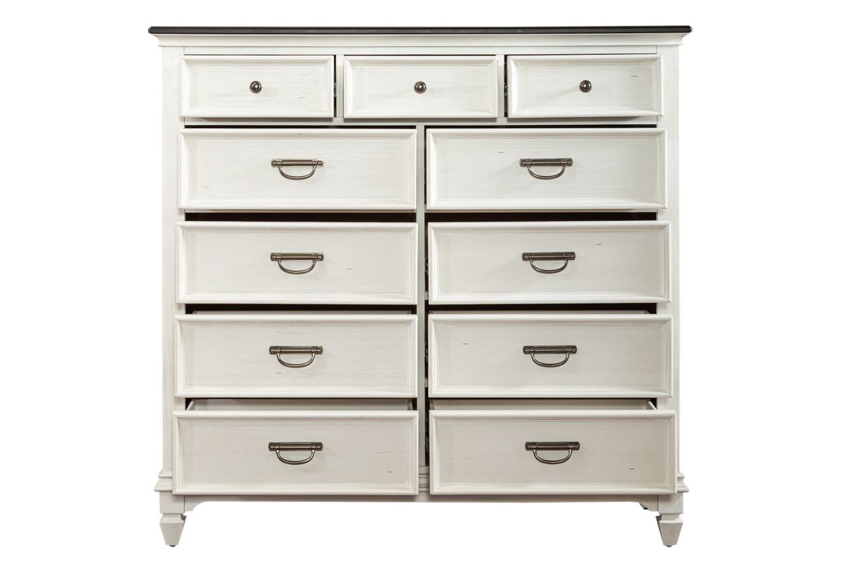 Front view of a white wood chesser with 11 drawers that are open.