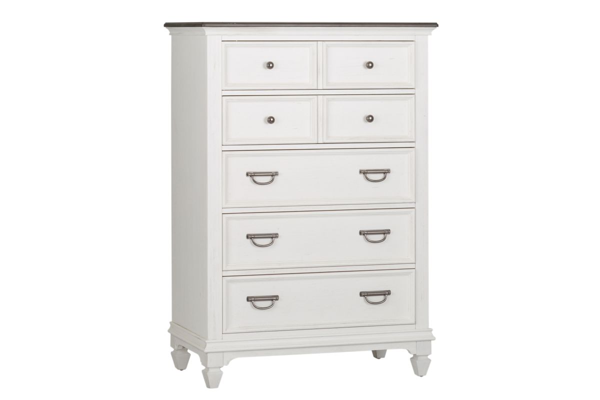 Corner view of a white wood chest with 5 drawers