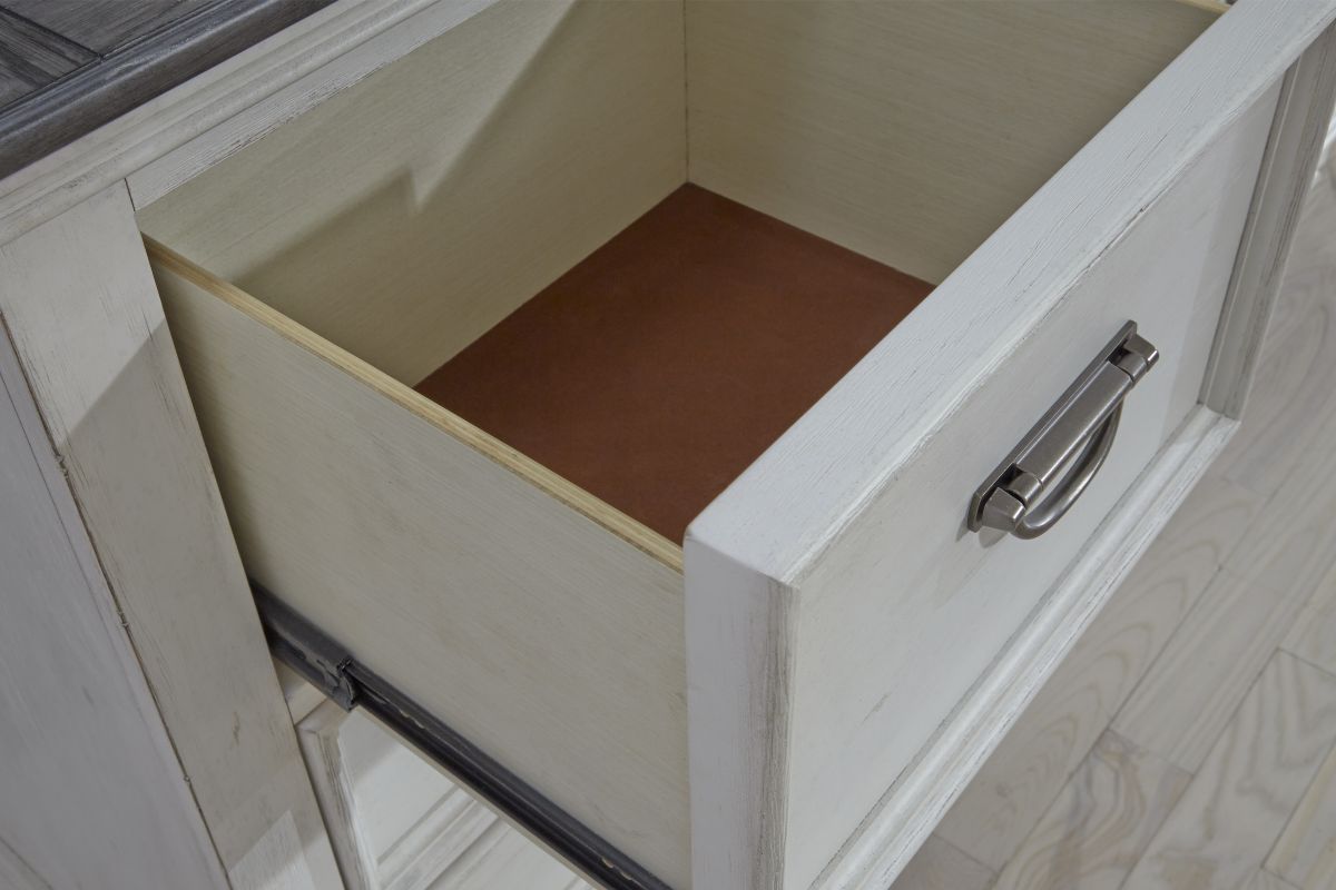 A close up image of one of the felt lined drawers in the Higgins Dresser