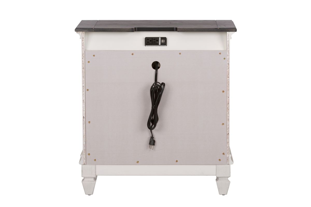 Back view of a white wood nightstand with an electrical cord
